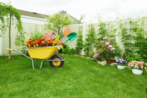 Garden waste and debris being cleared from a Waddon property